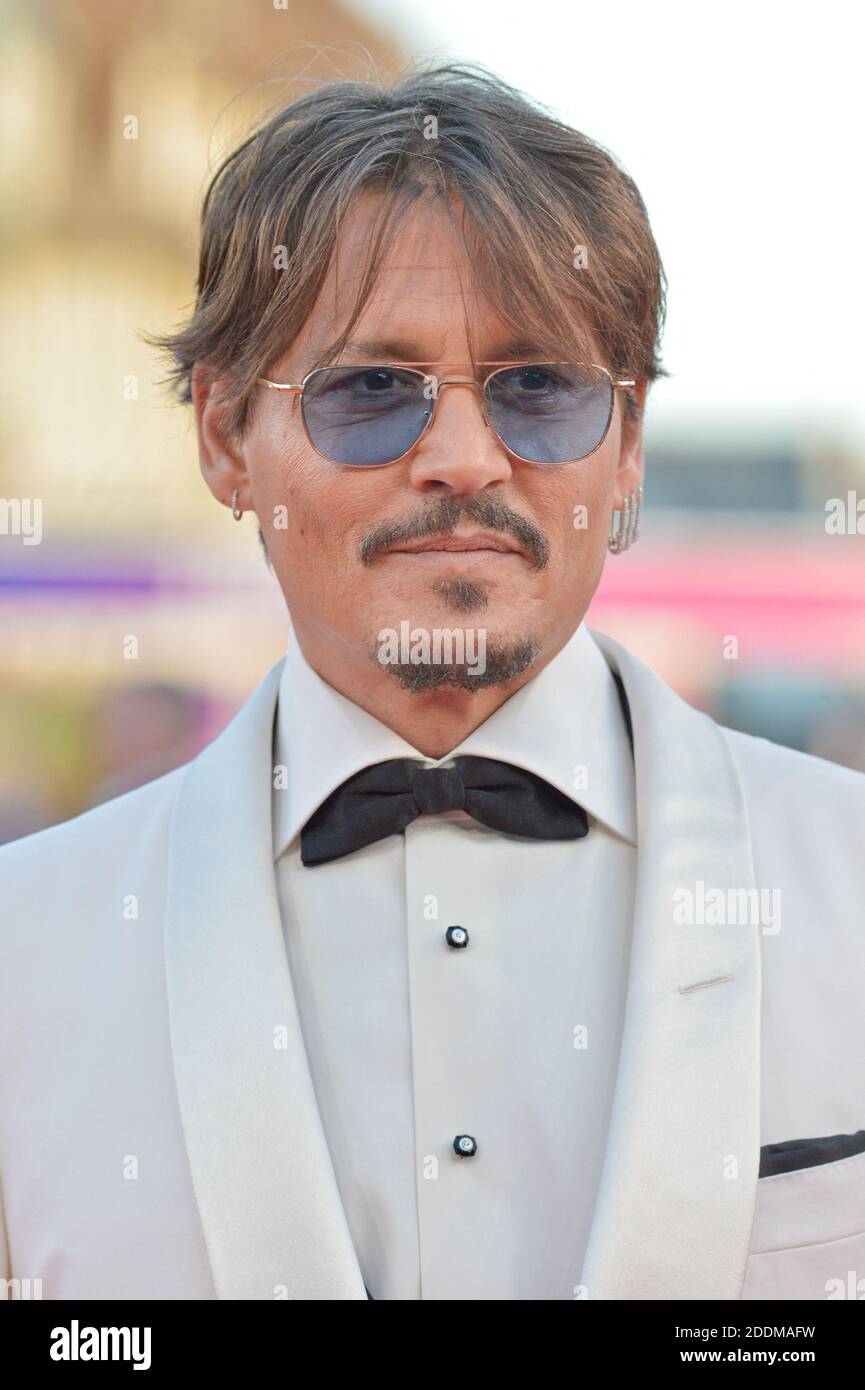 Johnny Depp attending the premiere of the movie Waiting For The