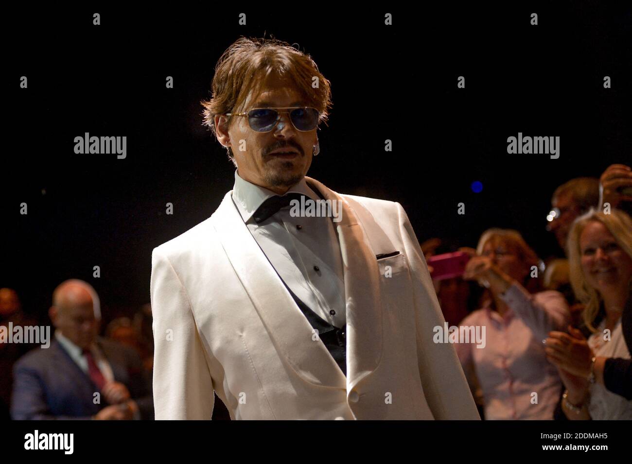 Johnny Depp attending the premiere of the movie Waiting For The
