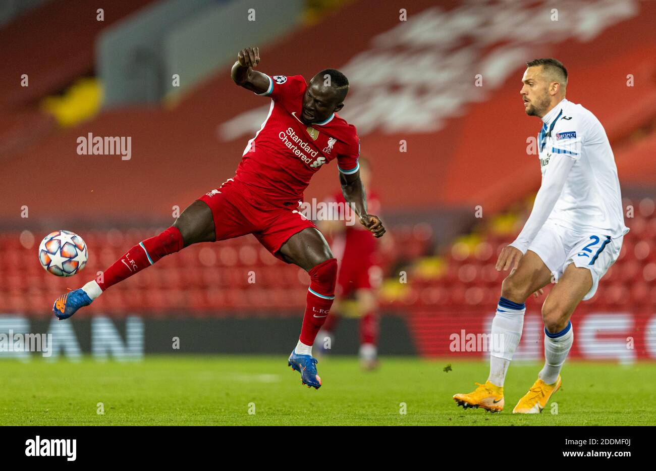 Liverpool. 26th Nov, 2020. Liverpool's Sadio Mane (L) controls the ball during the UEFA Champions League Group D match between Liverpool FC and Atalanta BC at Anfield in Liverpool, Britain, on Nov. 25, 2020. Credit: Xinhua/Alamy Live News Stock Photo