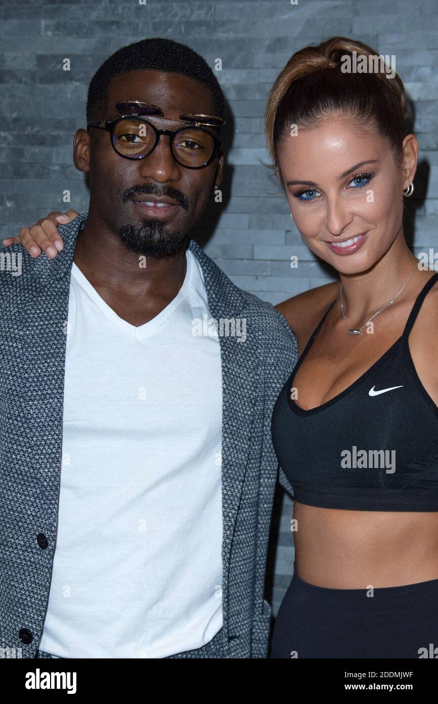 Cedric Doumbe and Malika Menard attending the Opening of the Fitwave