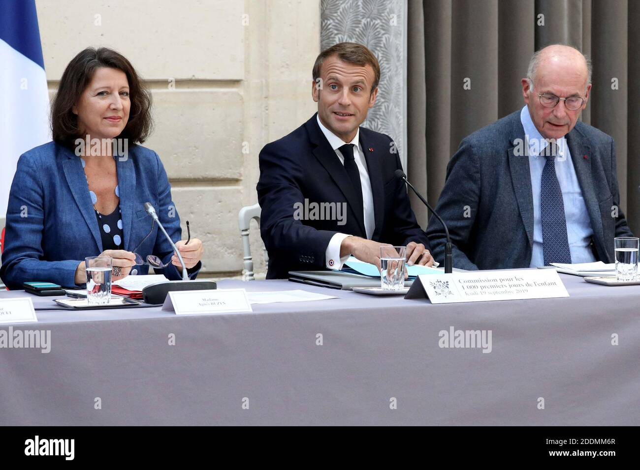 French President Emmanuel Macron inaugurates the Commission on 'the child's first 1000 days' (les 1000 premiers jours de l'enfant) with President of the Commission French neuropsychiatrist Boris Cyrulnik and French Minister for Solidarity and Health Agnes Buzyn, at the Elysee palace in Paris, on September 19, 2019. Photo by Stephane Lemouton/pool/ABACAPRESS.COM Stock Photo