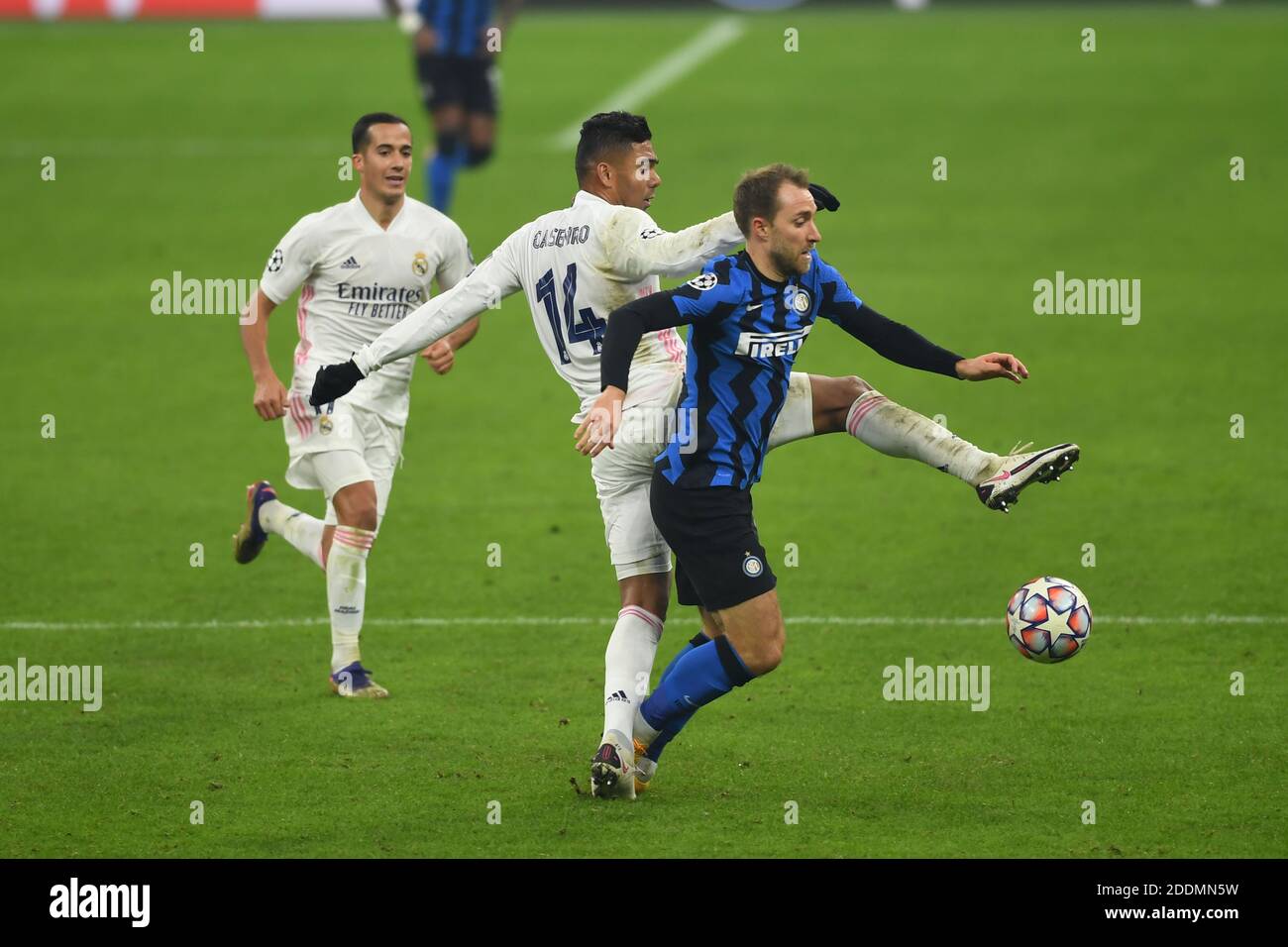 Milan, Italy. 25th Nov 2020. Christian Eriksen (Inter)Casemiro Carlos Henrique (Real Madrid)Lucas Vazquez (Real Madrid) during the Uefa Champions League match between Inter 0-2 Real Madrid at Giuseppe Meazza Stadium on November 25, 2020 in Milano, Italy. Credit: Maurizio Borsari/AFLO/Alamy Live News Stock Photo