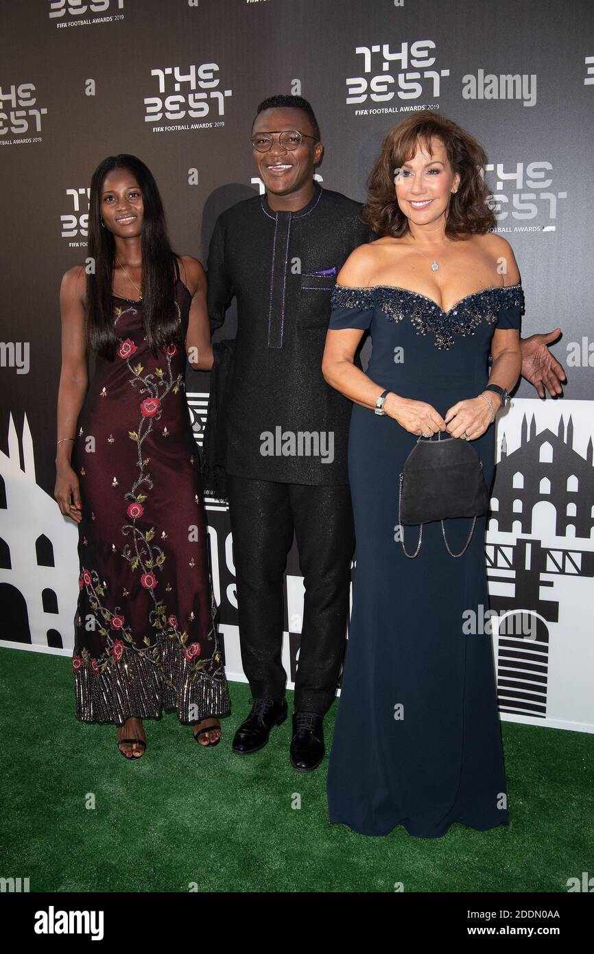 FIFA Legend Marcel Desailly and his wife and daughter attend the green