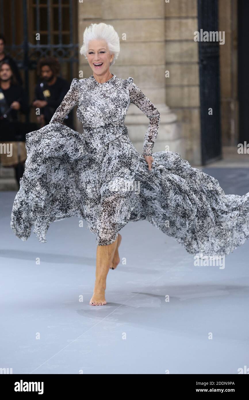 helen mirren silver dress Dame Helen Mirren? More like dayum, Helen Mirren! L'Oral delivered when it came to this year's Paris Fashion Week show, and as a shock to no one, Helen Mirren showed up and