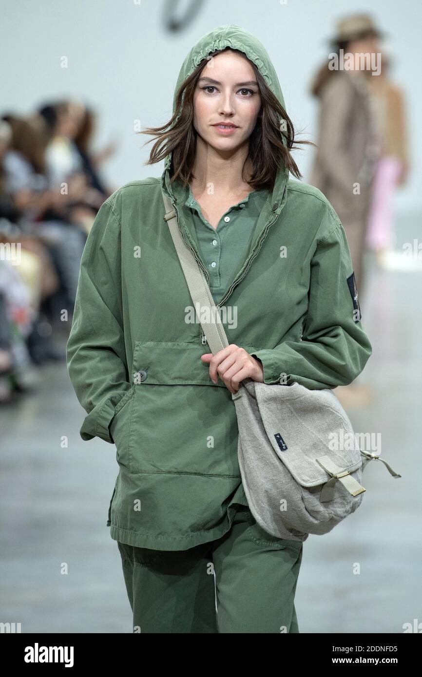 A model walks the runway during the Agnes B. Womenswear Spring