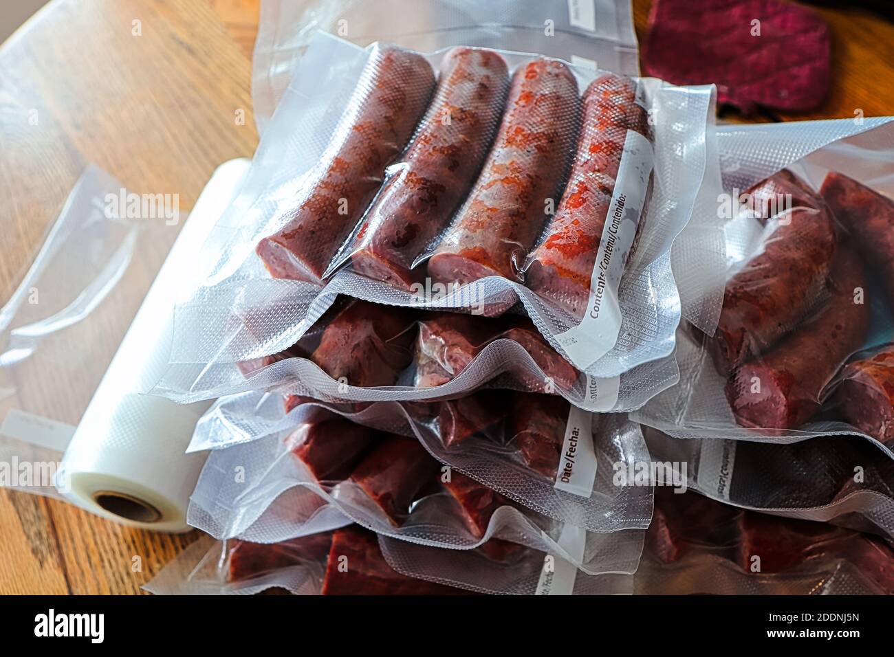 Vacuum sealed sausages ready to be frozen Stock Photo