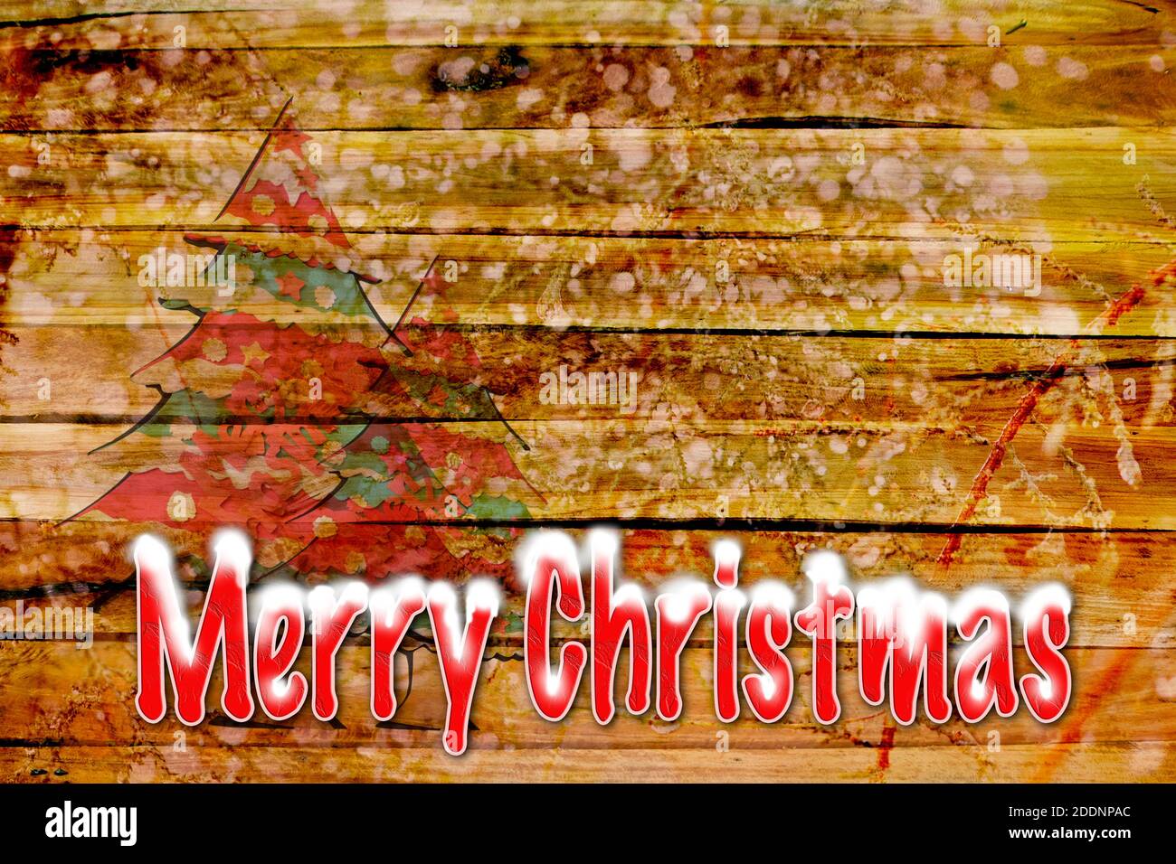 Christms tree and wooden background with snow over words merry christmas. Stock Photo