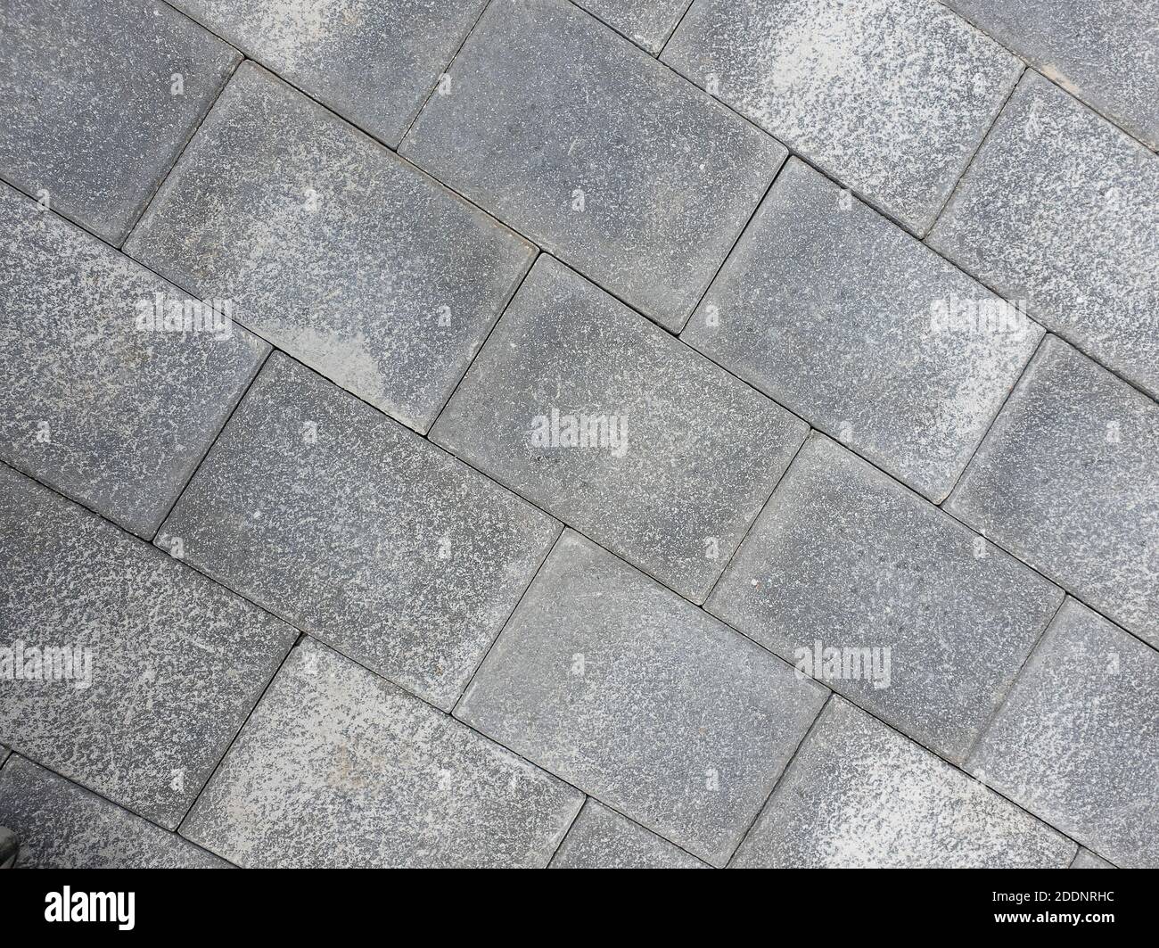 Grey brick wall texture background. Tiled. Gray wall from bricks background. Stock Photo