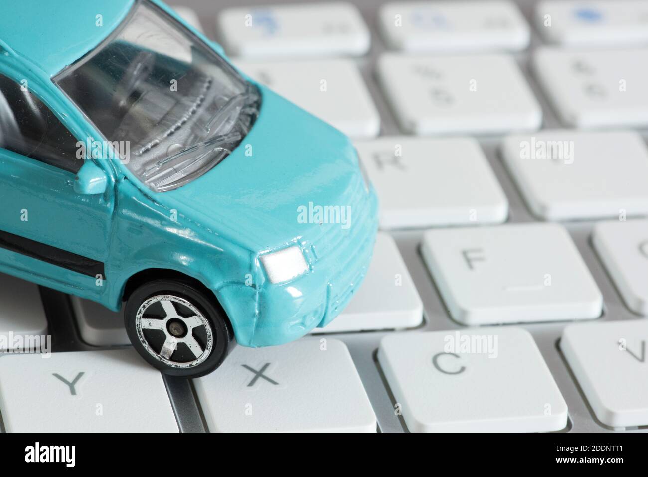 A car and a computer Stock Photo - Alamy