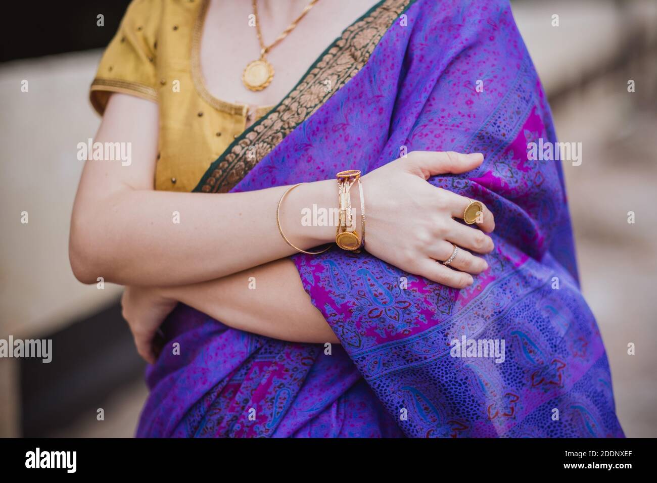 Young european woman with short hair in purple traditional saree. Outdoor  portrait in soft sunlight. India, Bangalore, close-up Stock Photo - Alamy