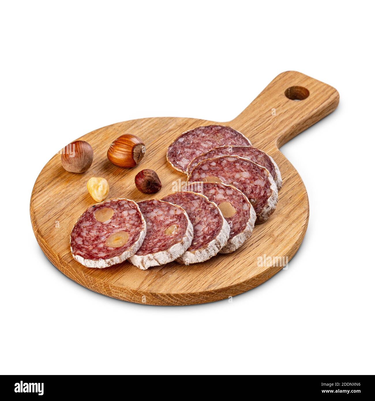 Gourmet salami with noble mold crust. Sliced sausage salami with filbert on wooden cutting board Stock Photo