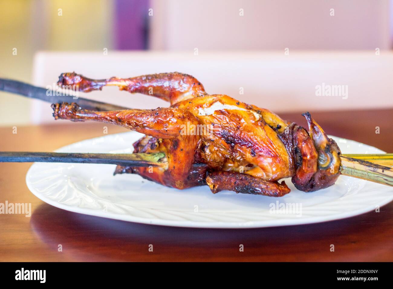 A roast native chicken at a restaurant in Cebu City, Philippines Stock