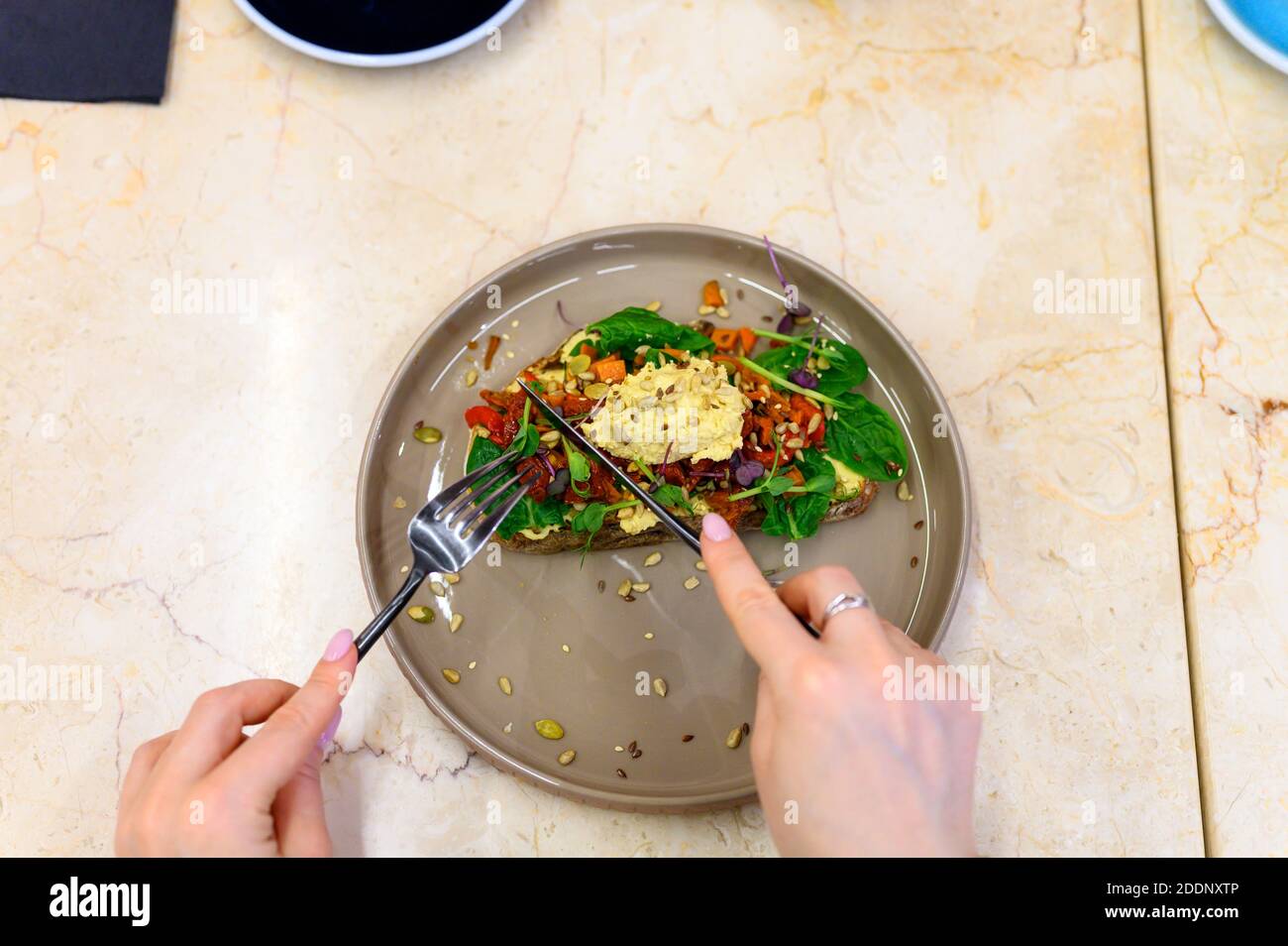 Female knife fork hands hi-res stock photography and images - Alamy