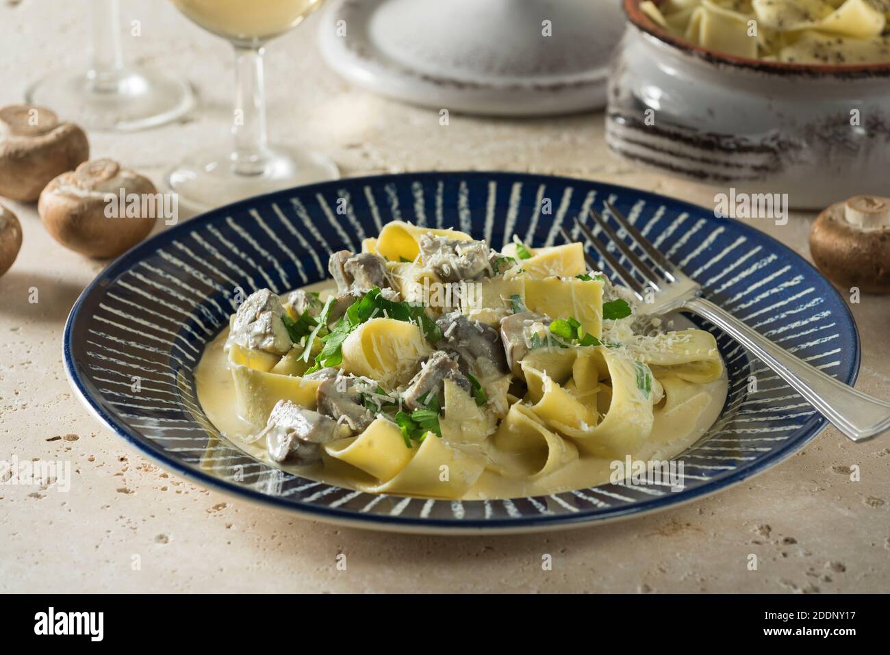 Pasta ai funghi. Pappardelle with mushrooms. Italy Food Stock Photo