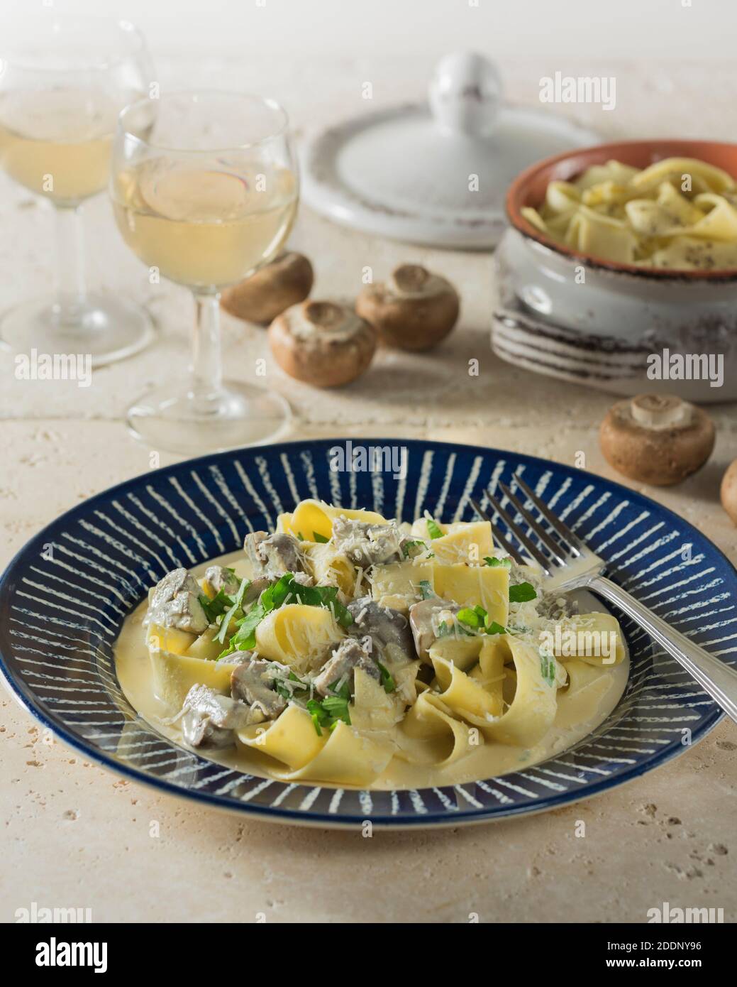 Pasta ai funghi. Pappardelle with mushrooms. Italy Food Stock Photo