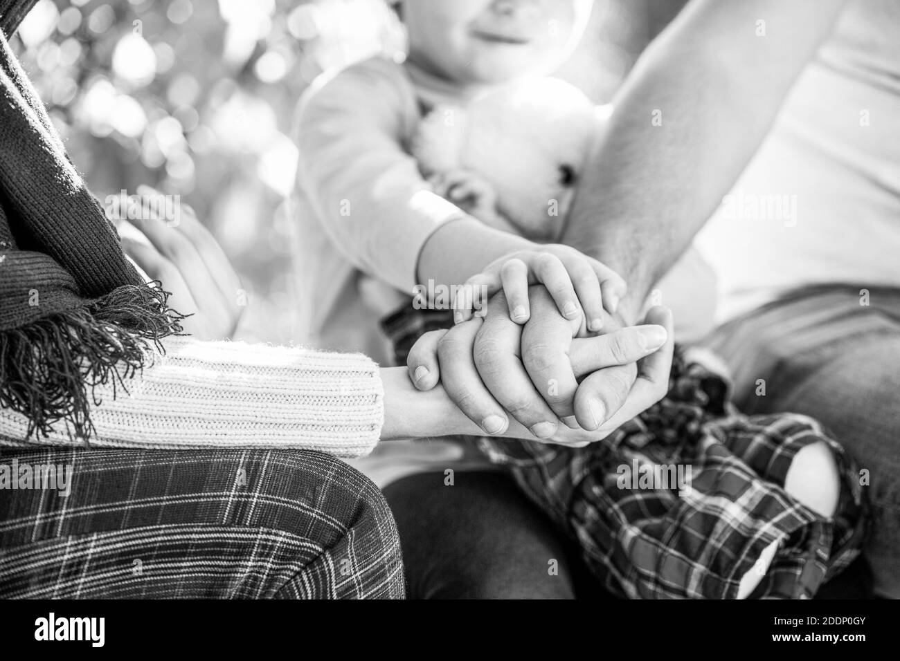 Hands Of Father Mother Keep Hand Little Baby Parents Hold The Baby Hands Closeup Of Baby Hand Into Parents Hands Black And White Stock Photo Alamy