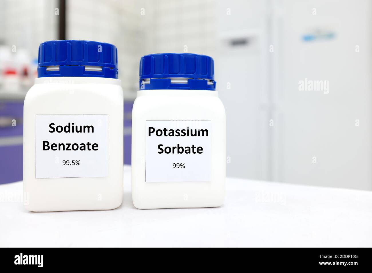Selective focus of bottle of pure potassium sorbate and sodium benzoate
