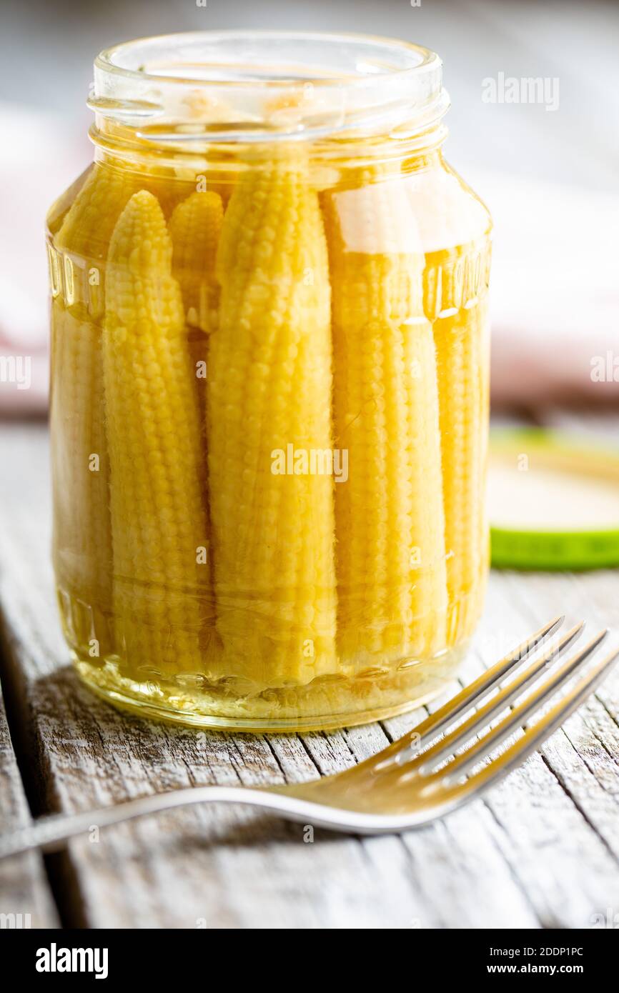 Pickled young baby corn cobs in a jar Stock Photo Alamy