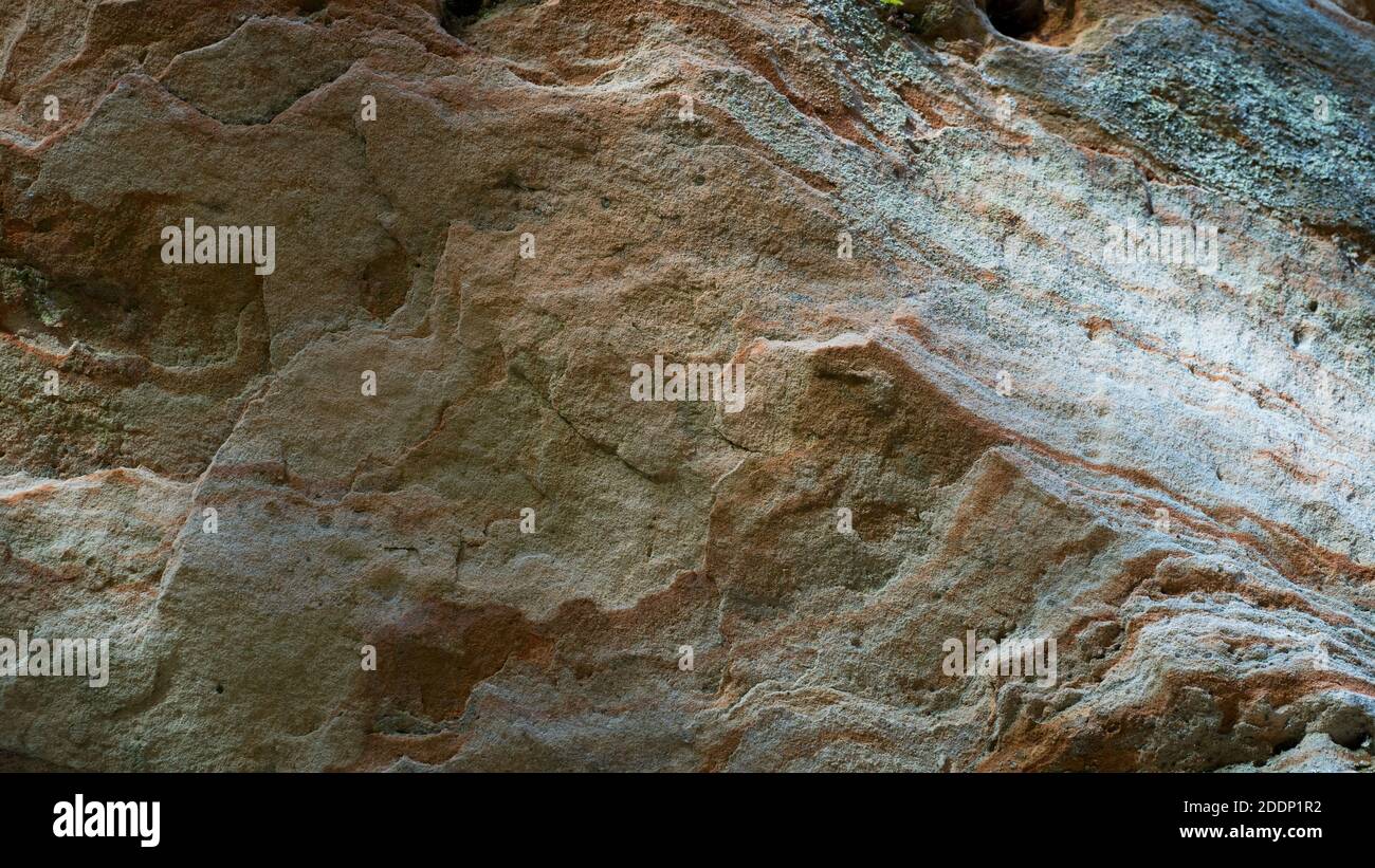 Sandy mountain wall background with relief Stock Photo