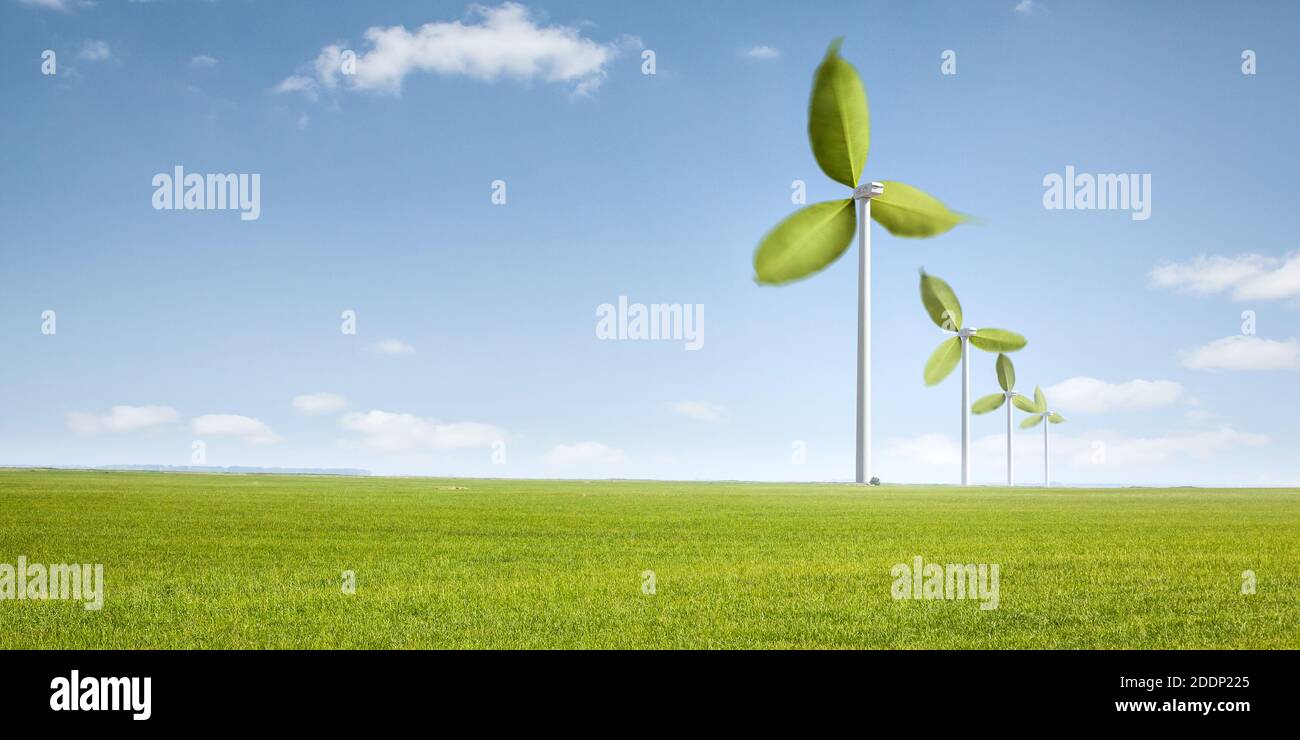 Wind turbines with green leaves as rotors Stock Photo