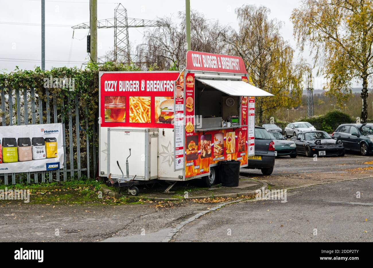 Basingstoke, UK - November 17, 2020: A mobile burger van parked in the Daneshill East Industrial Estate in Basingstoke, Hampshire on a cloudy autumn d Stock Photo