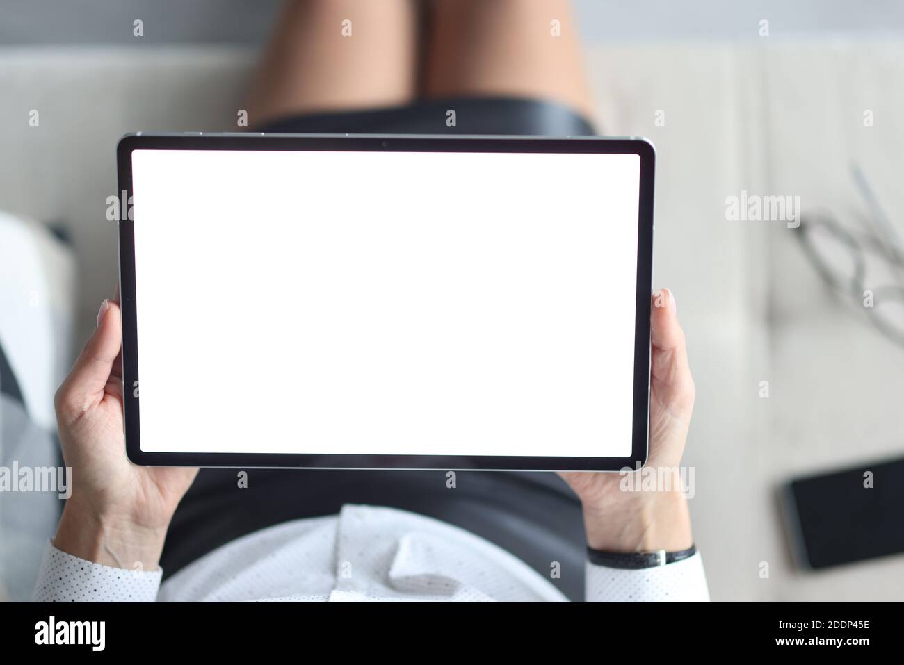 In female hands tablet with white screen Stock Photo - Alamy