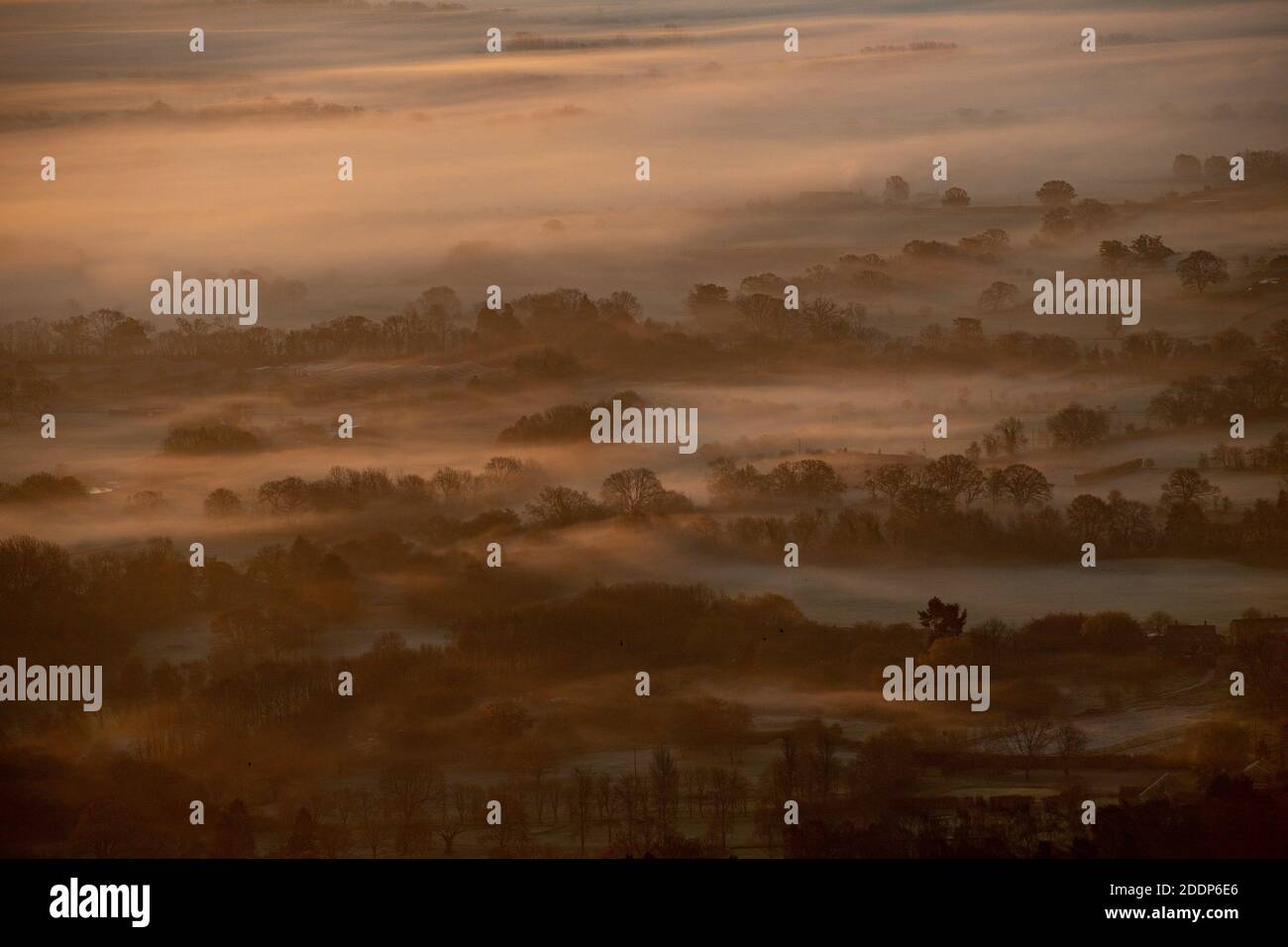 The sun rises over a foggy Worcestershire. Stock Photo