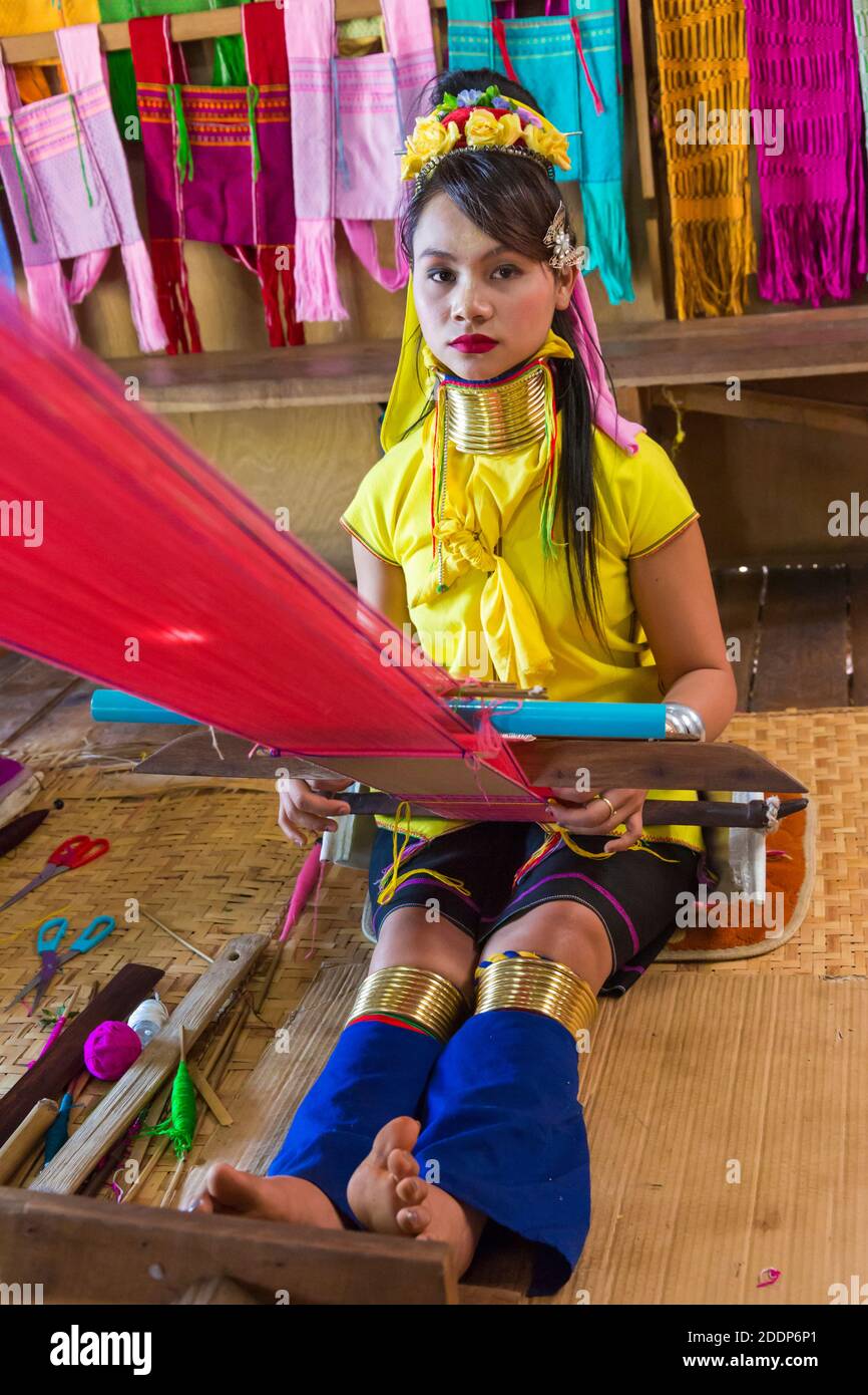 Padaung lady, long neck lady, weaving in Ywama Village, Shan State, Inle Lake, Myanmar (Burma), Asia in February Stock Photo