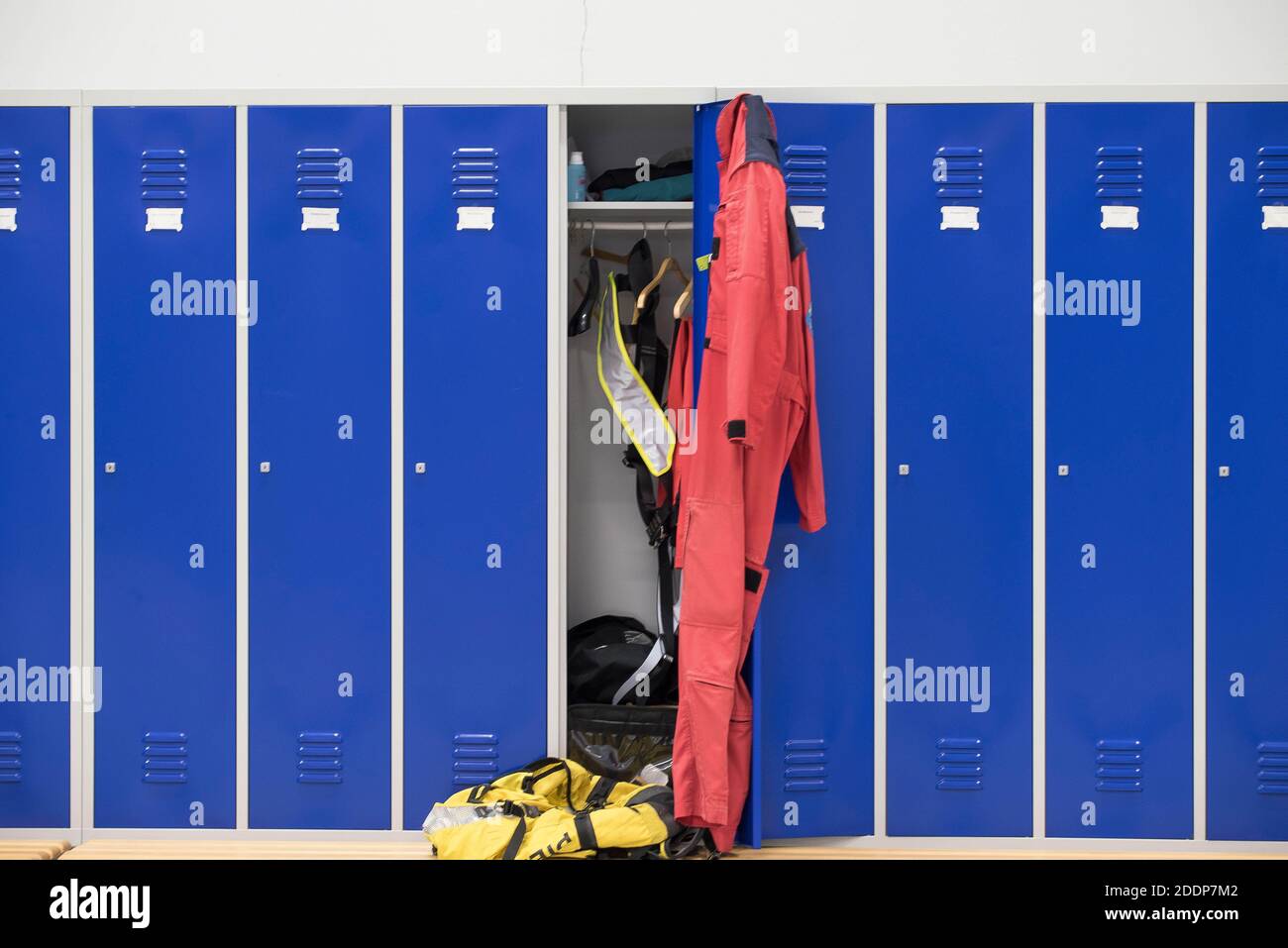 locker room with blue lockers for the employees at the work place Stock