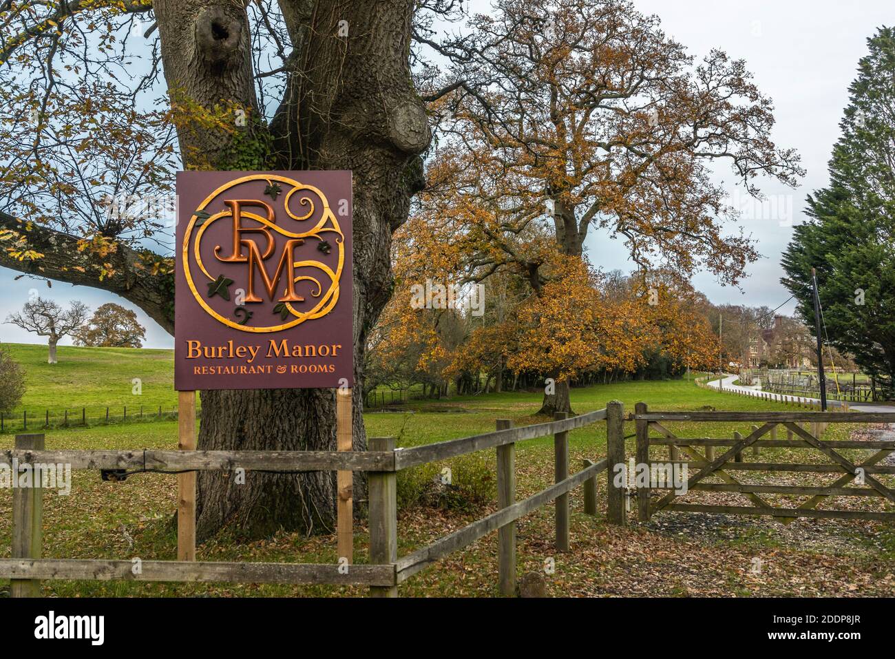 Entrance sign to Burley Manor house during autumn, Burley Manor is a 4 star hotel and restaurant in the New Forest, Hampshire, England, UK Stock Photo