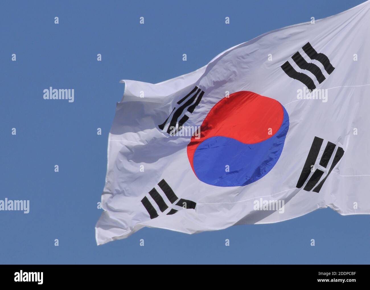 South Korean flag in blue sky, Seoul, South Korea Stock Photo