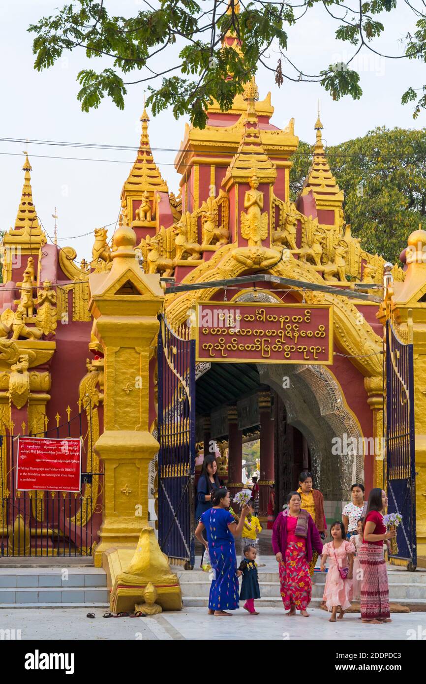 Visitors at Kuthodaw Pagoda, Myanmar (Burma), Asia in February Stock Photo