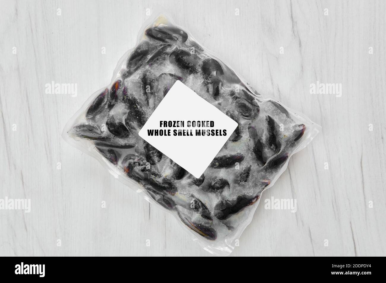 Frozen cooked whole shell mussels in package Stock Photo Alamy