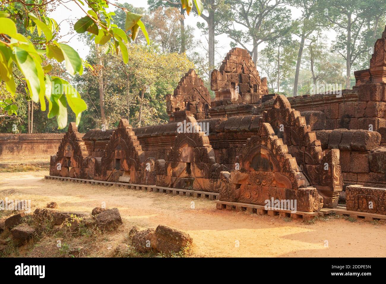 Outer wall of the temple Banteay Srei - a 10th-century Cambodian temple in area of Angkor near Siem Reap, Cambodia Stock Photo