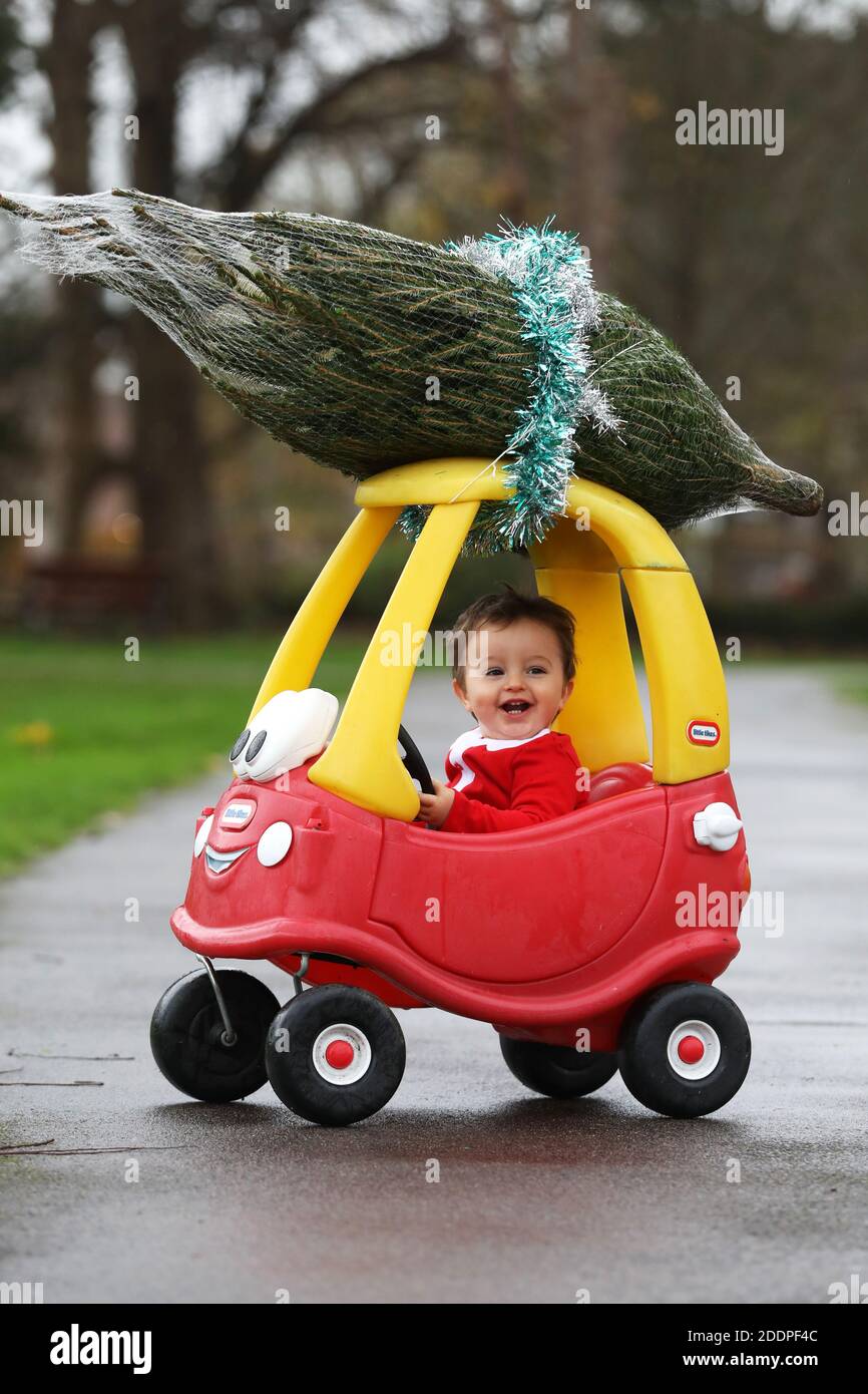 Cute oneyearold boy called Oscar pictured dressed as Father Christmas