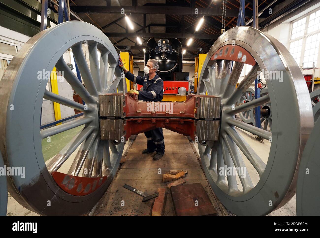 Fabricator and painter Ian Mathews, 56, works on the construction of No. 2007 'Prince of Wales' steam locomotive at the A1 Locomotive Trust in Darlington, County Durham. Stock Photo