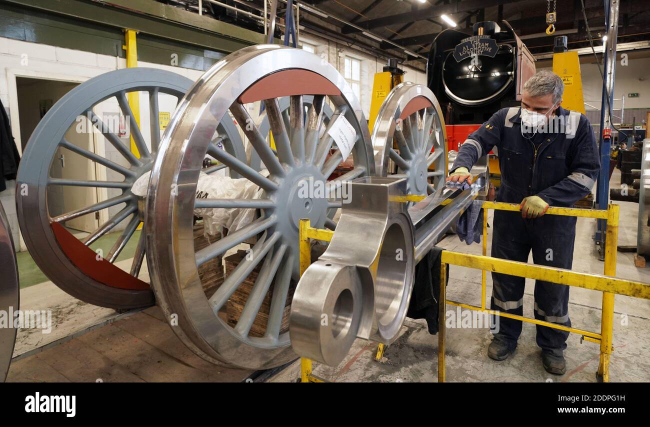 Fabricator and painter Ian Mathews, 56, works on the construction of No. 2007 'Prince of Wales' steam locomotive at the A1 Locomotive Trust in Darlington, County Durham. Stock Photo