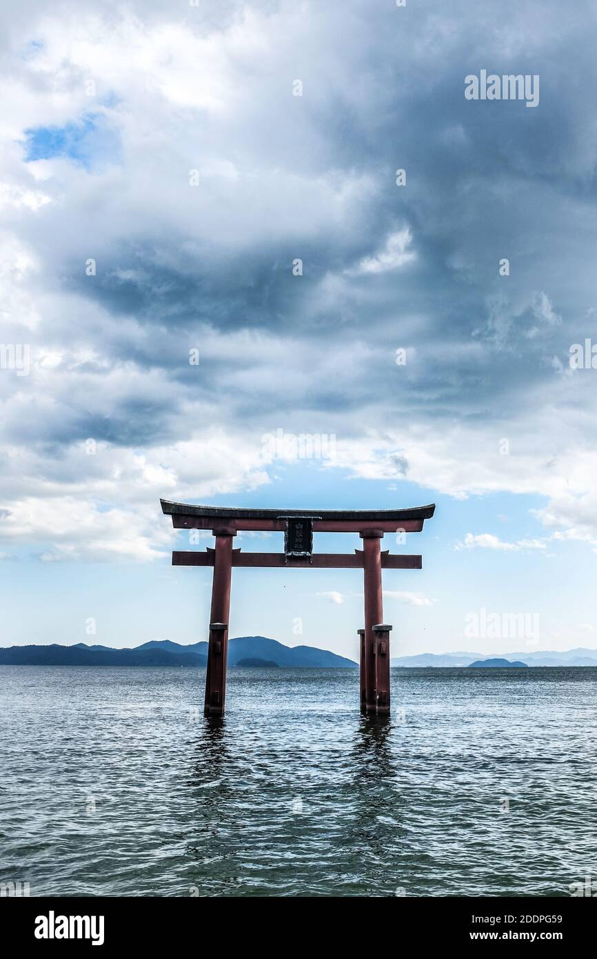 The torii (gate) of Shirahige jinja (shrine) in Shiga, Japan. The gate stands in Biwako (Lake Biwa), Japan's largest lake. Stock Photo