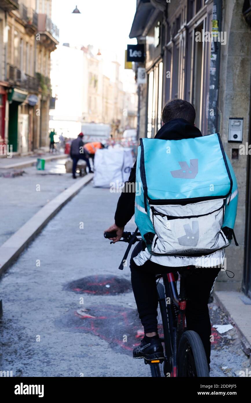 Bordeaux , Aquitaine / France 11 11 2020 deliveroo man with back