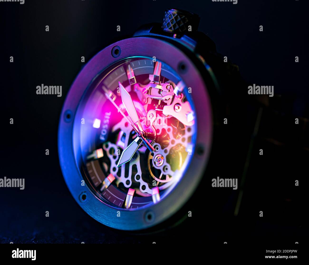 Fossil watch under RBG lights Stock Photo Alamy