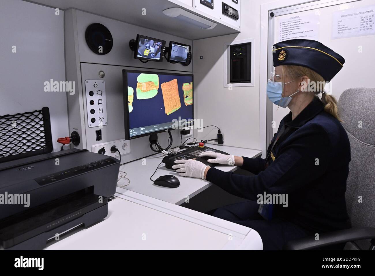 A worker of the customs pictured at a press meeting regarding the fight against counterfeit consumer goods and e-commerce, Thursday 26 November 2020 i Stock Photo