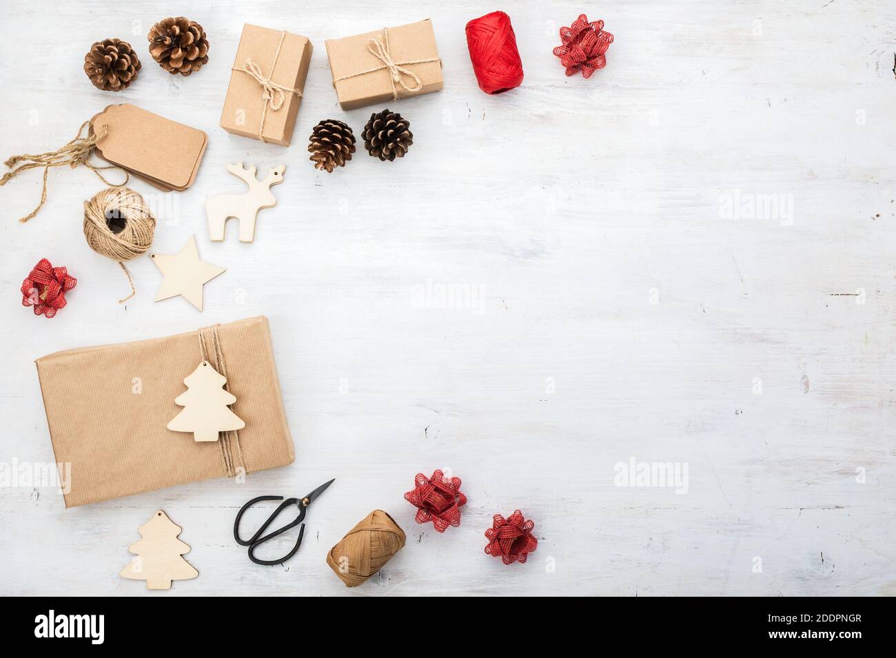 Christmas background, presents in brown boxes on white table Stock Photo