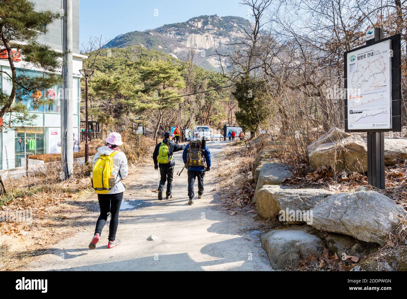 Korean hikers climbing the rock at the Bukhansan Mountain National park