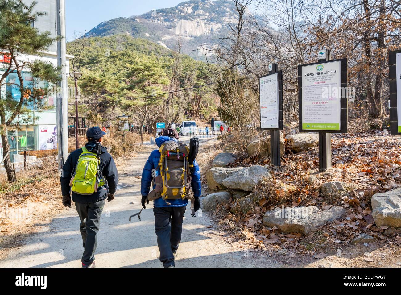 Korean hikers climbing the rock at the Bukhansan Mountain National park