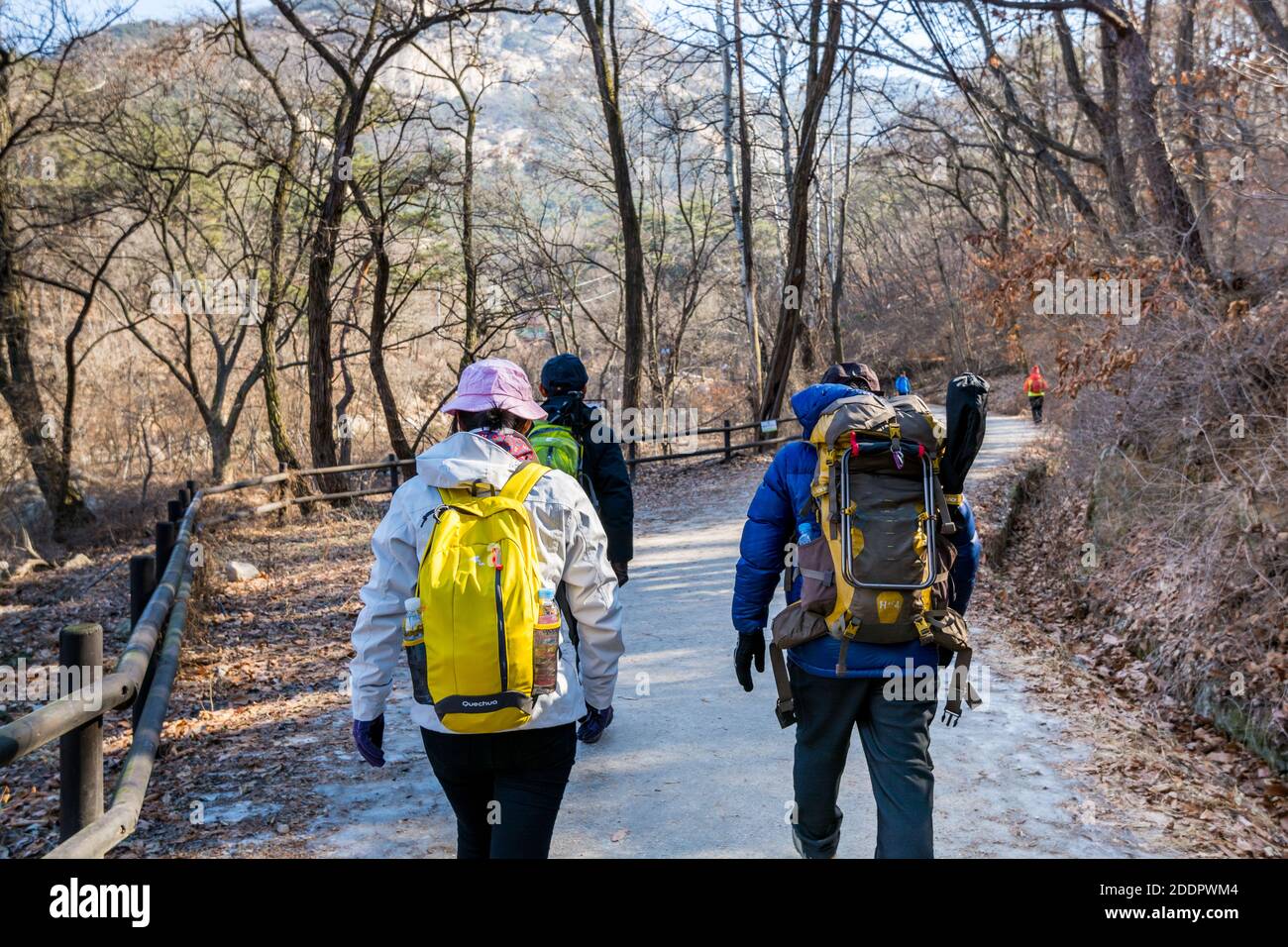 Korean hikers climbing the rock at the Bukhansan Mountain National park