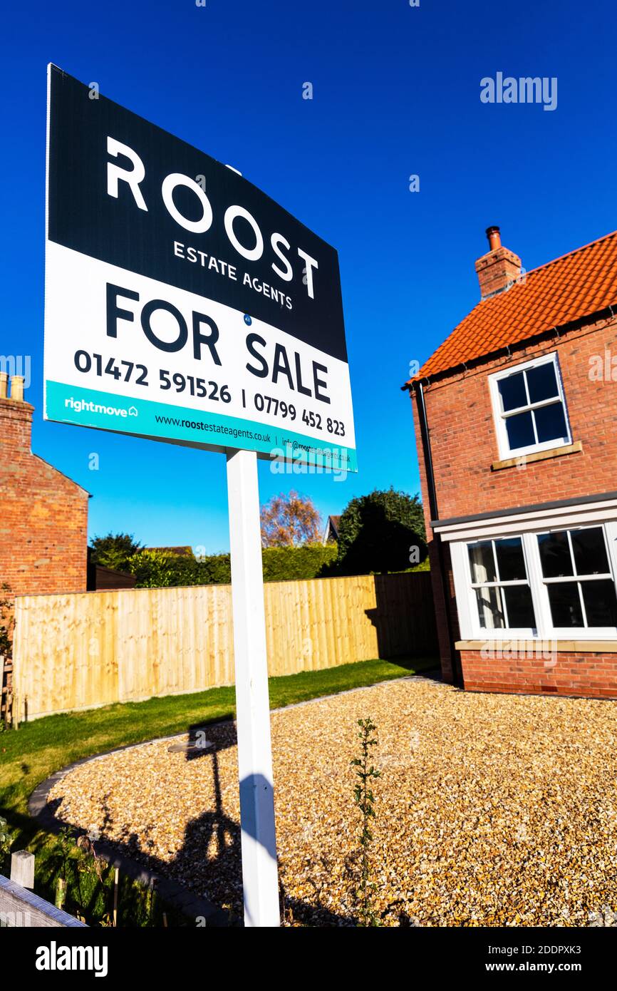 Roost Estate Agents, Estate agent board, estate agent for sale board, property for sale, house for sale board, estate agent sign, for sale, property Stock Photo