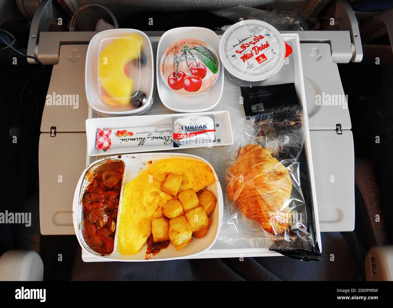 A set of food for a passenger on an Emirates airline flight Stock Photo