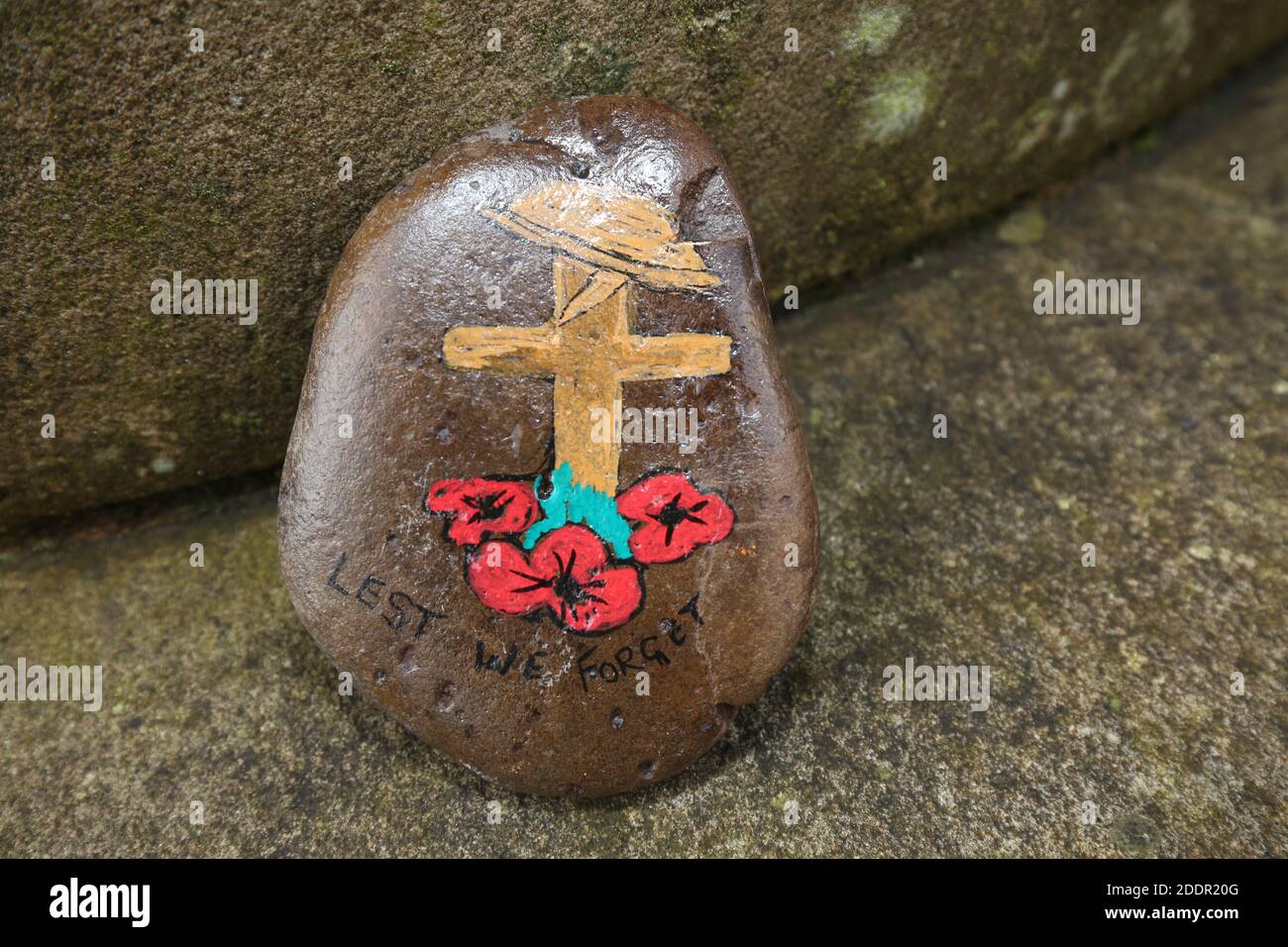 Painted stones depicting scenes from the war to commerate remembrance