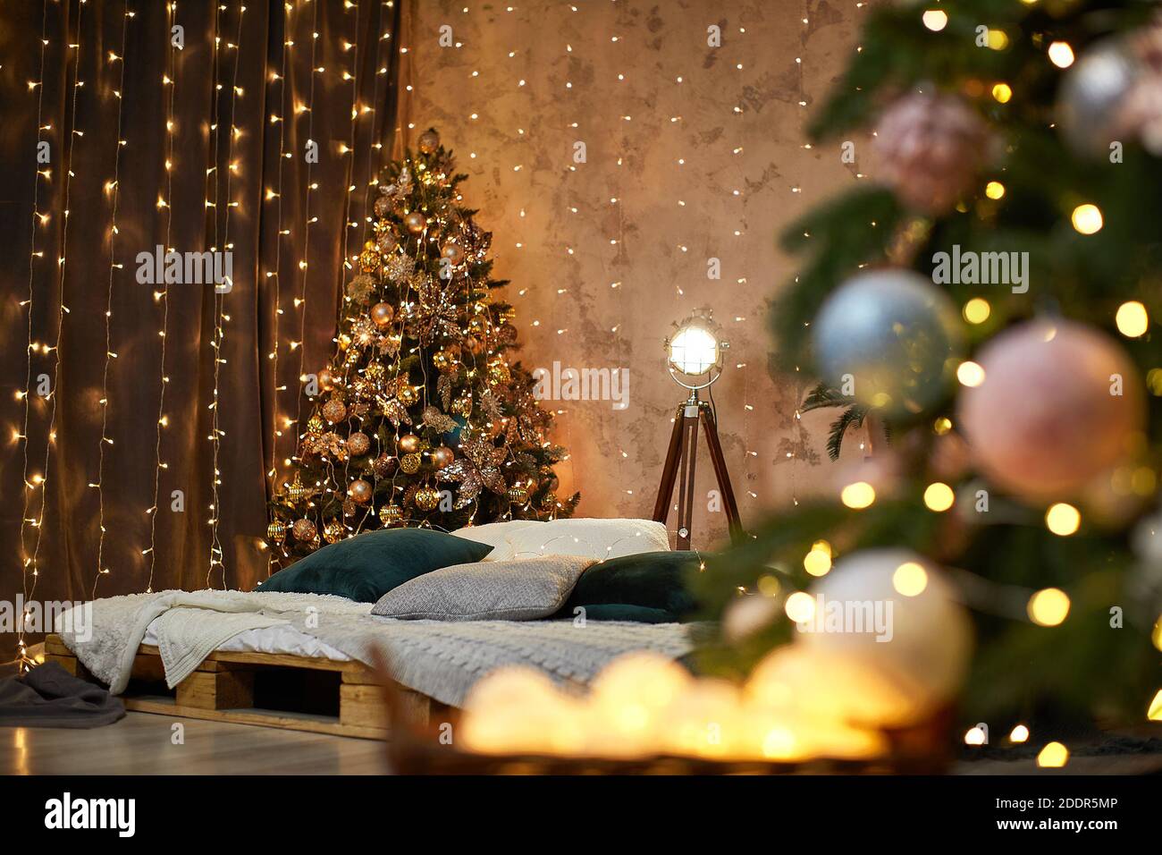 New year interior in studio. Christmas decorated bedroom Stock Photo - Alamy