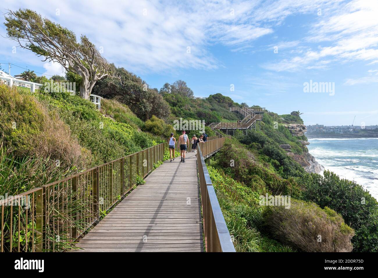 Sydney, Australia - People walking on the Coogee to Bondi coastal walk. This famous coastal walk extends for six km in Sydney's eastern suburbs. Stock Photo
